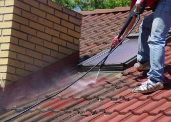 depositphotos_279101324-stock-photo-house-roof-cleaning-with-pressure